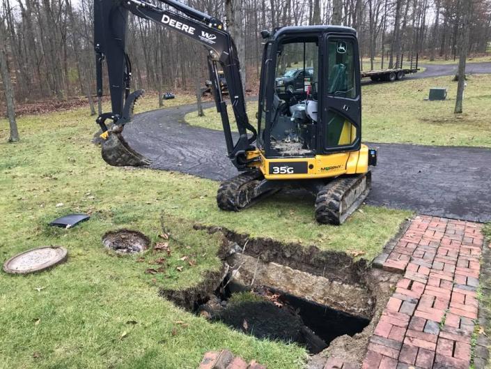 We carry the best equipment like our John Deere backhoe loader! 